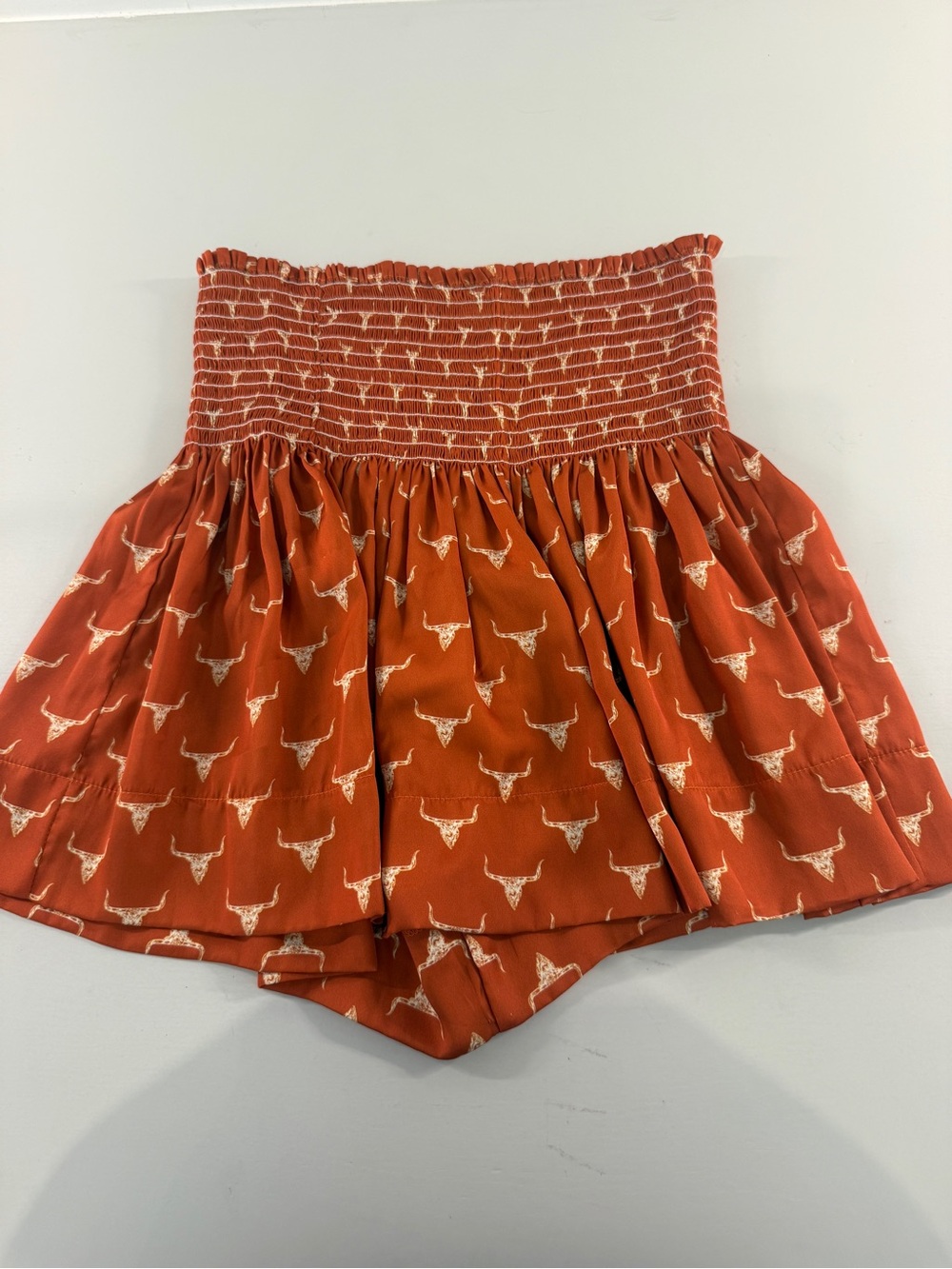 KOCH Skirt High-Waist Rust Smocked Shorts with Cream Longhorn Print
